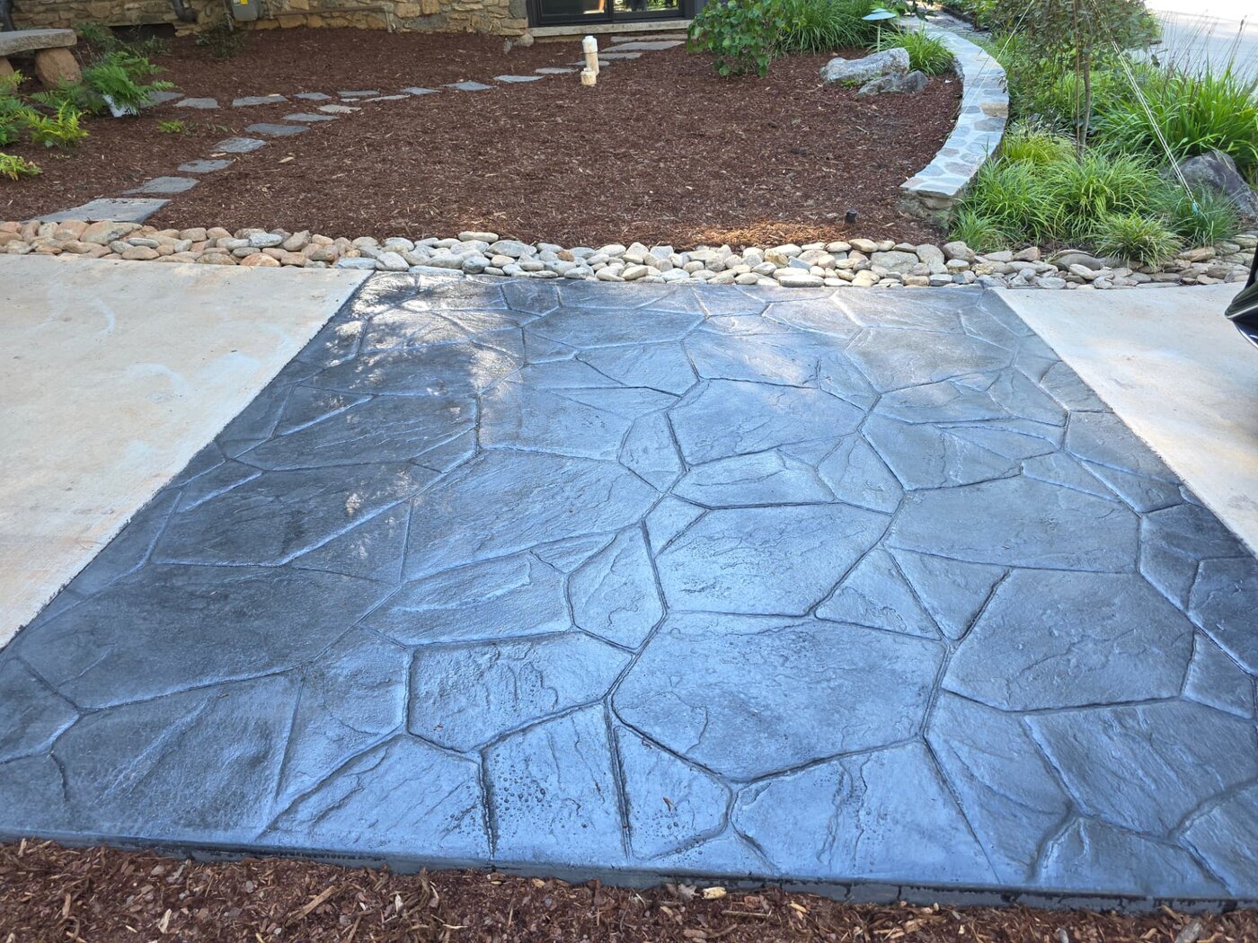 Stamped concrete patio with flagstone pattern at an Asheville, NC home
